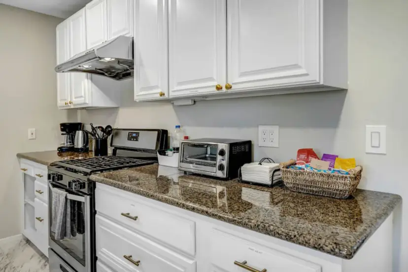 Kitchen with a gas range and granite counters