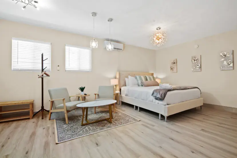 Studio with a king bed and a sitting area