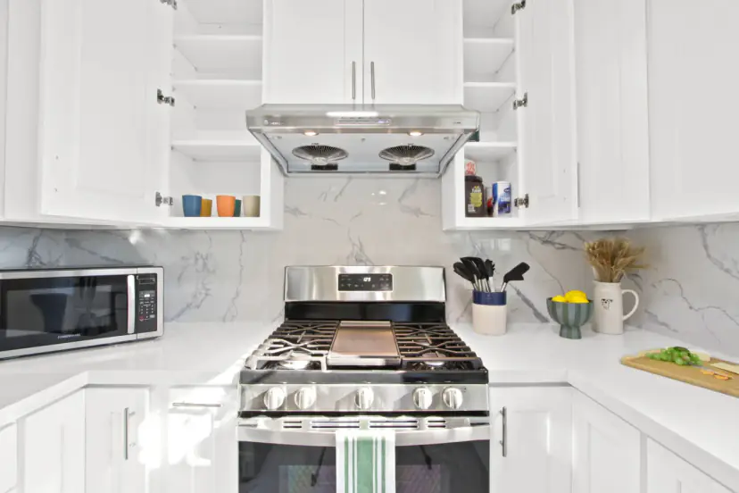 Gas range with a griddle under the hood
