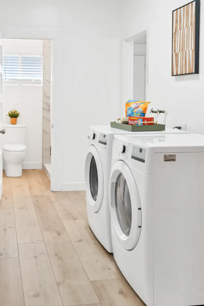 Laundry room with a front-load washer and dryer