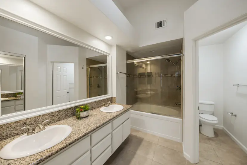 Primary bath with a double vanity and tub