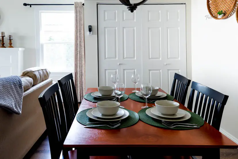 Dining table for four by the living room