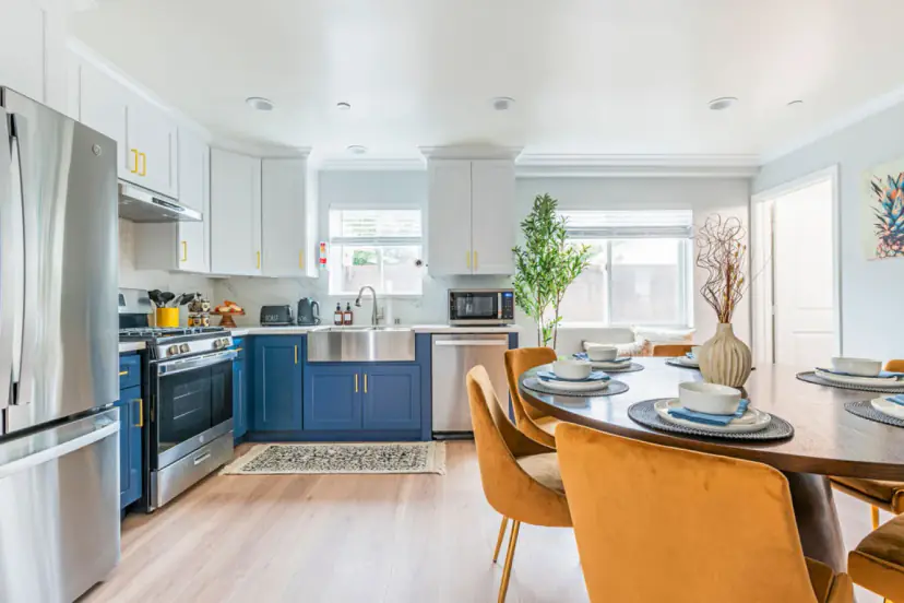 Kitchen, dining table and living room on one open floor