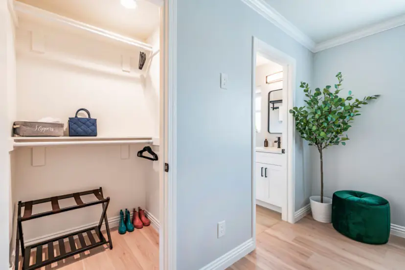 Bedroom with a walk-in closet and an ensuite bathroom