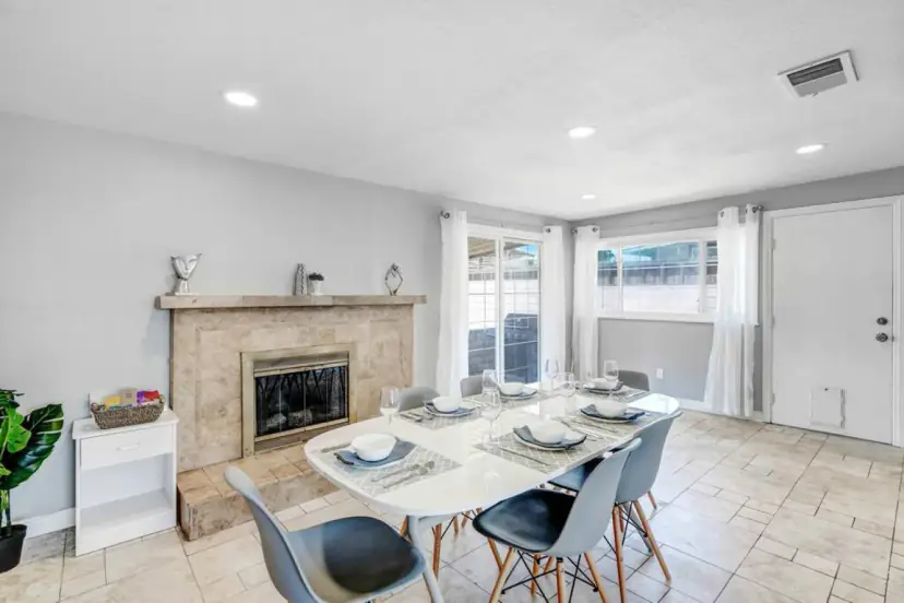 Dining room with a brick fireplace