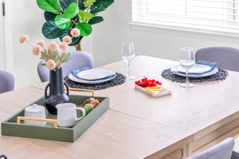 Dining table set with plates and glasses