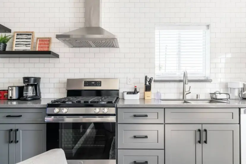 Kitchen with a gas range and subway tile