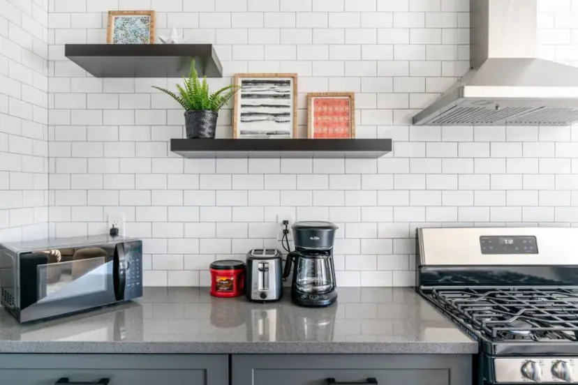 Kitchen shelves with a microwave and coffee maker