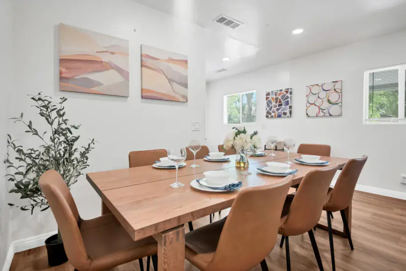 Long wood dining table set for eight