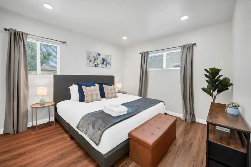 Bedroom with a king bed and a storage bench