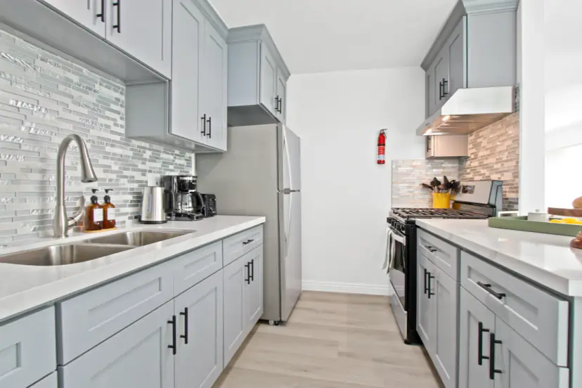 Galley view of the kitchen with a gas range