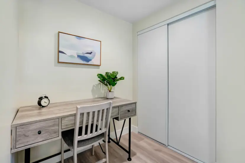 Desk nook beside a sliding closet