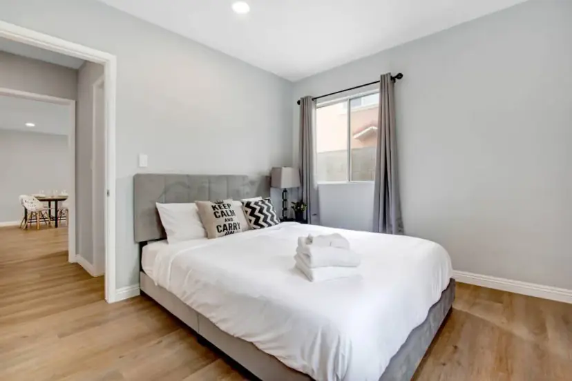 Bedroom with an upholstered queen bed