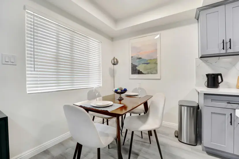 Dining table with white chairs