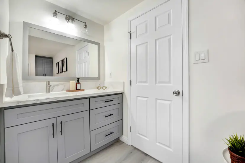 Bathroom vanity with grey cabinets