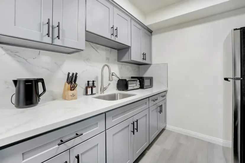 Kitchen counter with a kettle and a knife block