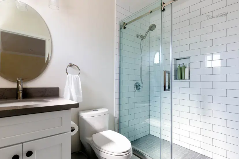 Bathroom with a vanity and glass walk-in shower