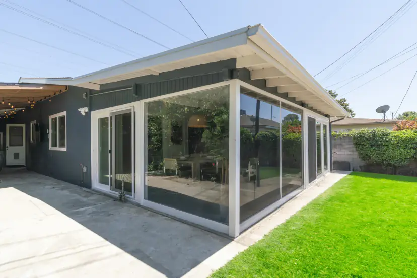 Glass-walled dining room from the lawn
