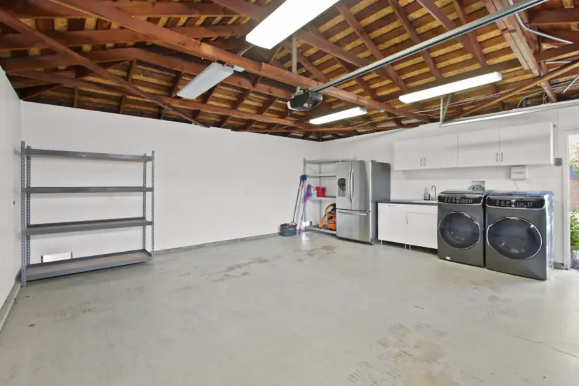 Garage with a washer and dryer