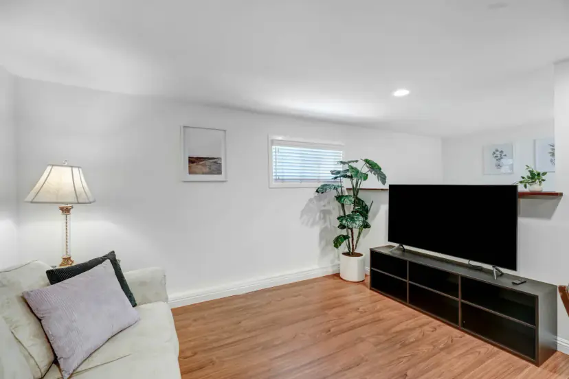 Sitting area with a sofa and a TV