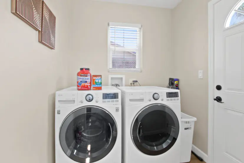 Laundry room with a washer and dryer