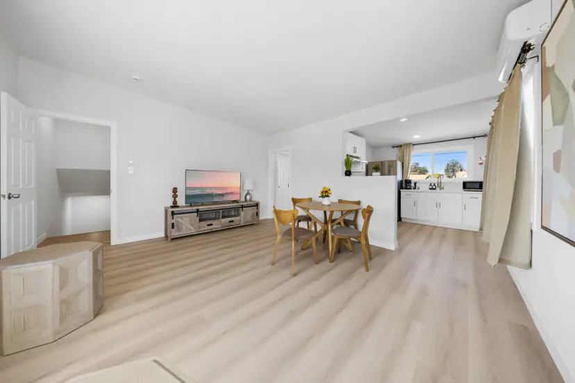 Upstairs living room open to the kitchen