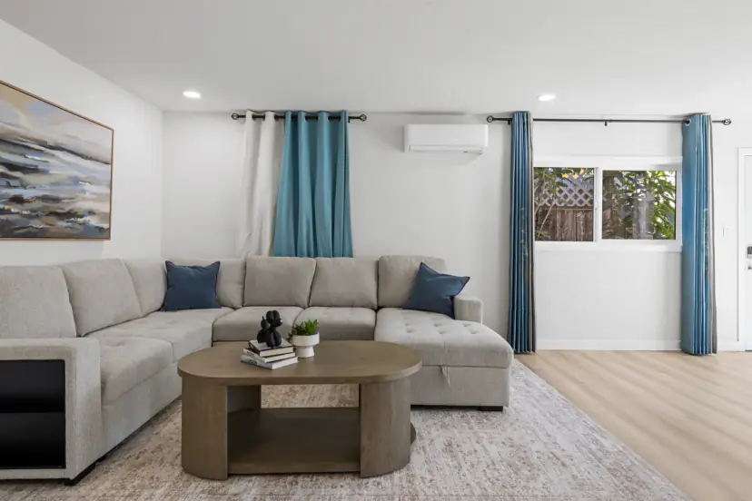 Sectional sofa with an oval coffee table